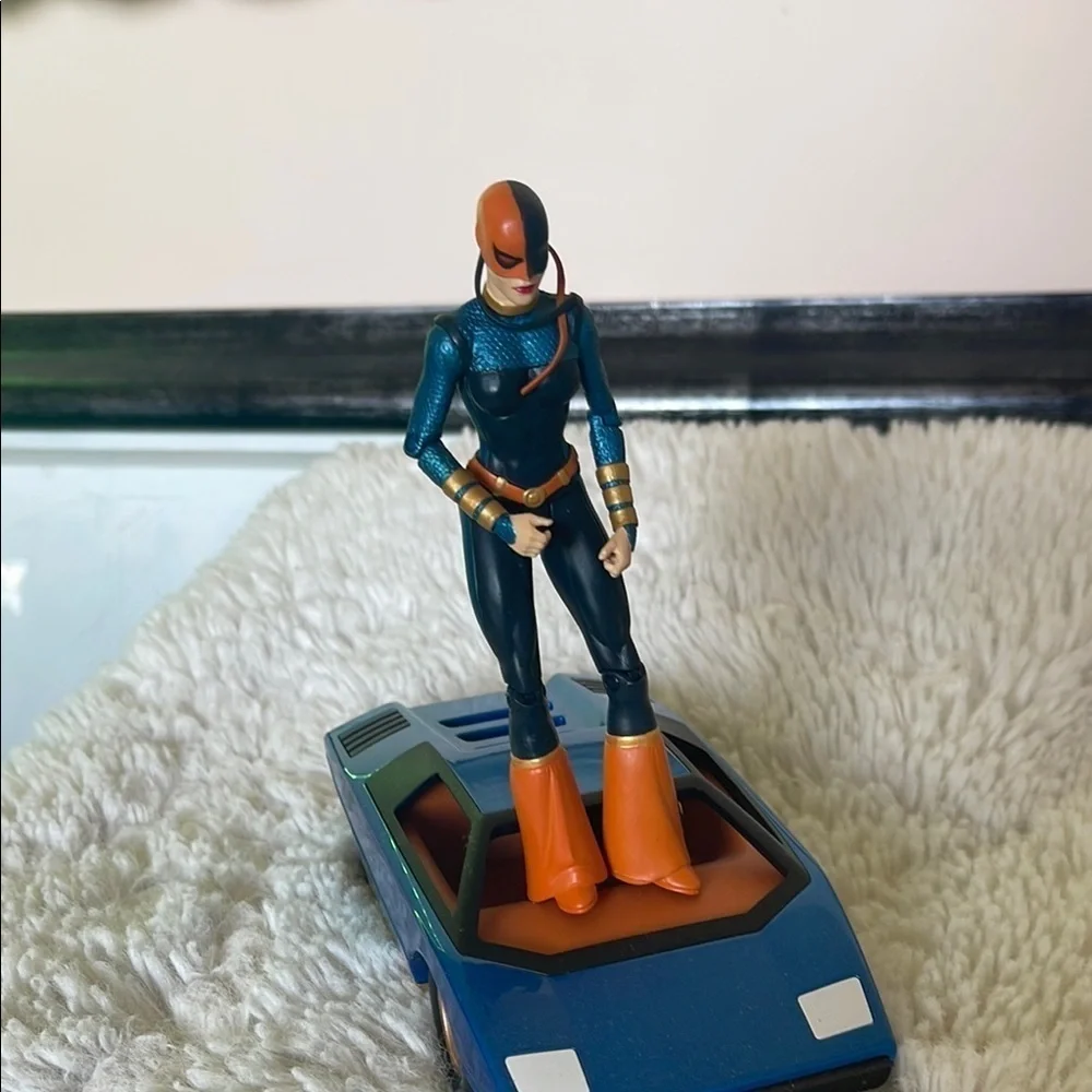 Action Figure with Orange and Blue Costume